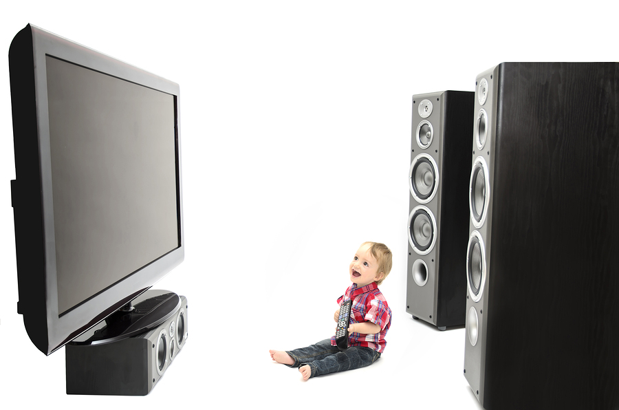 baby playing by the tv